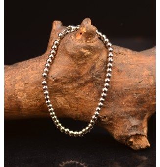 Bracelet 4 mm en  acier inoxydable, avec perles diam 4 mm acier inoxydable