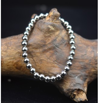 Bracelet élastique tout en  acier inoxydable, avec perles diam 6 mm acier inoxydable