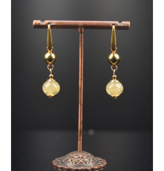 Boucles d’oreilles “ivoire”...