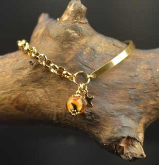 Bracelet demi-jonc doré...