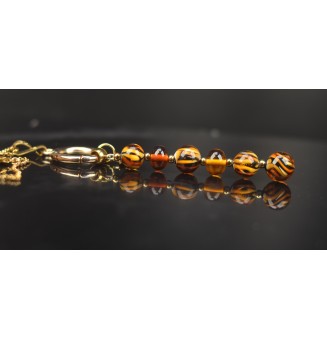 Collier "Éclat de Joie"Léopard" en perles de verre filé - acier inoxydable doré