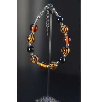 Bracelet artisanal en perles de verre – Motif Léopard, Noir & Ambre