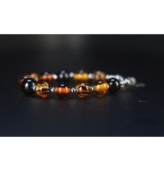 Bracelet artisanal en perles de verre – Motif Léopard, Noir & Ambre