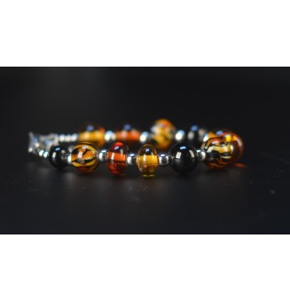 Bracelet artisanal en perles de verre – Motif Léopard, Noir & Ambre