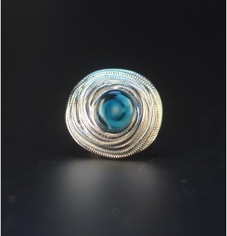 Bague bleu pétrole en verre...