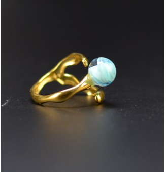 Bague bleu clair en verre...
