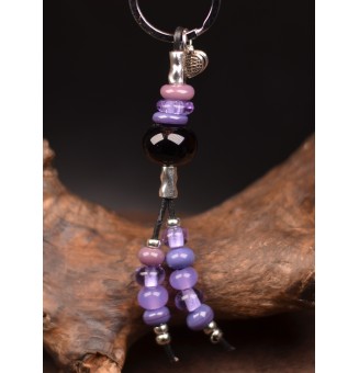bijou de sac ( ou porte clés) perles de verre noir et violet
