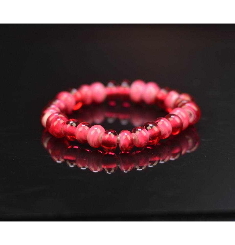 Bracelet élastique en perles de verre fuchsia